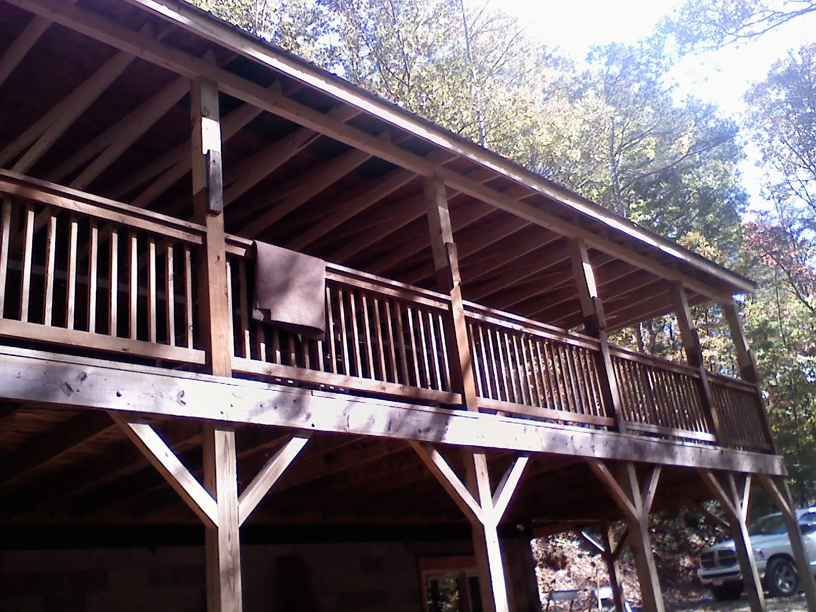 Timber framing under a new elevated porch and deck — Roof Leak Repair in Northborough by Roofing Brothers